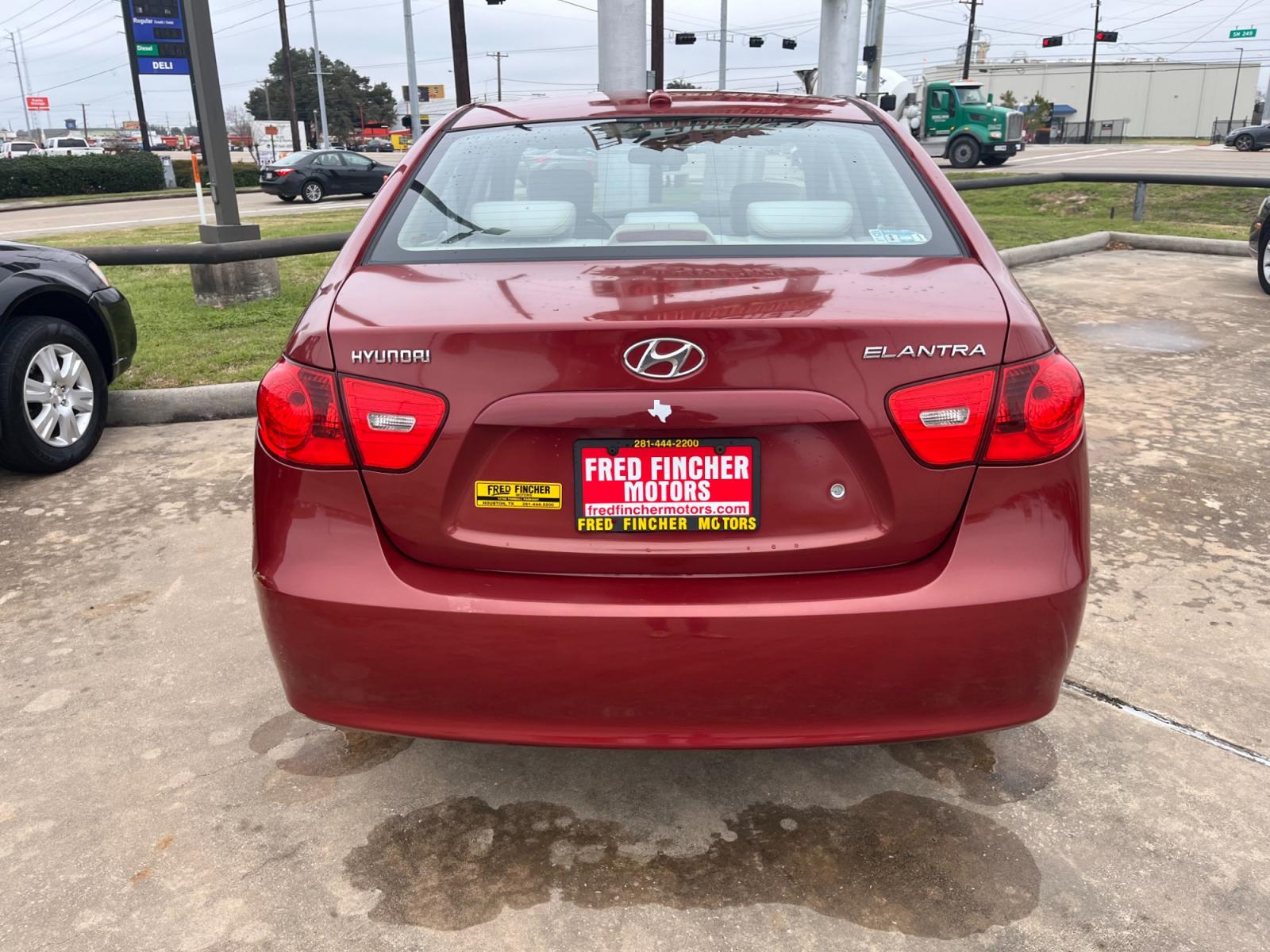 2008 red /TAN Hyundai Elantra GLS (KMHDU46D78U) with an 2.0L L4 DOHC 16V engine, Manual transmission, located at 14700 Tomball Parkway 249, Houston, TX, 77086, (281) 444-2200, 29.928619, -95.504074 - Photo #5